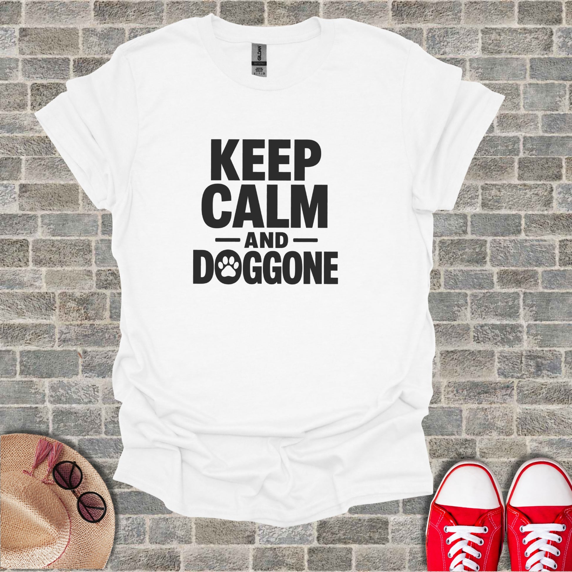 White t-shirt with "Keep Calm and Doggone" text and paw print.