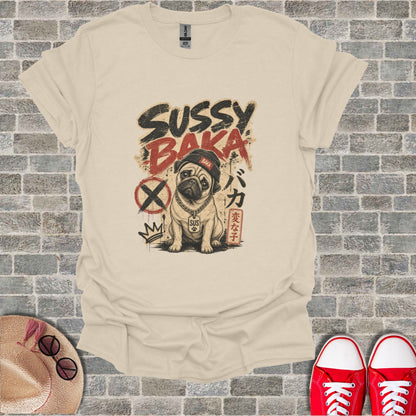 Tan t-shirt with a pug wearing a crown and "Sussy Baka" text.