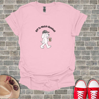 Pink t-shirt with cartoon dog walking and text "Off To Watch Baseball".