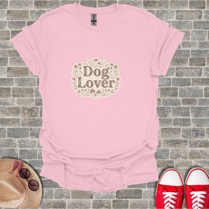 Pink t-shirt with "Dog Lover" text and floral design.