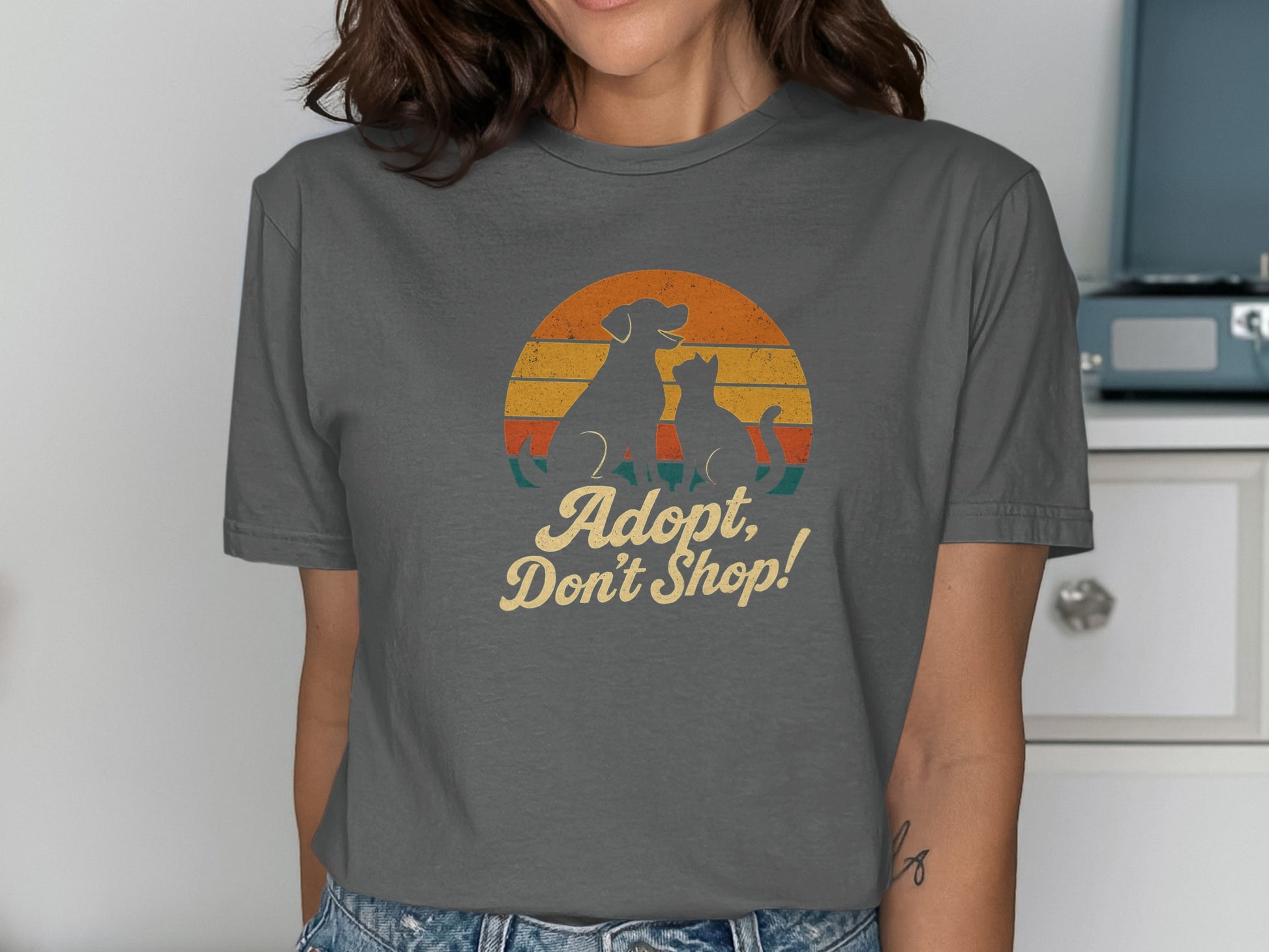 Adopt Don't Shop Graphic Tee product