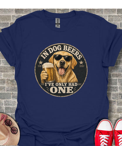 Labrador wearing sunglasses holds beer, "In dog beers I've only had one" text.