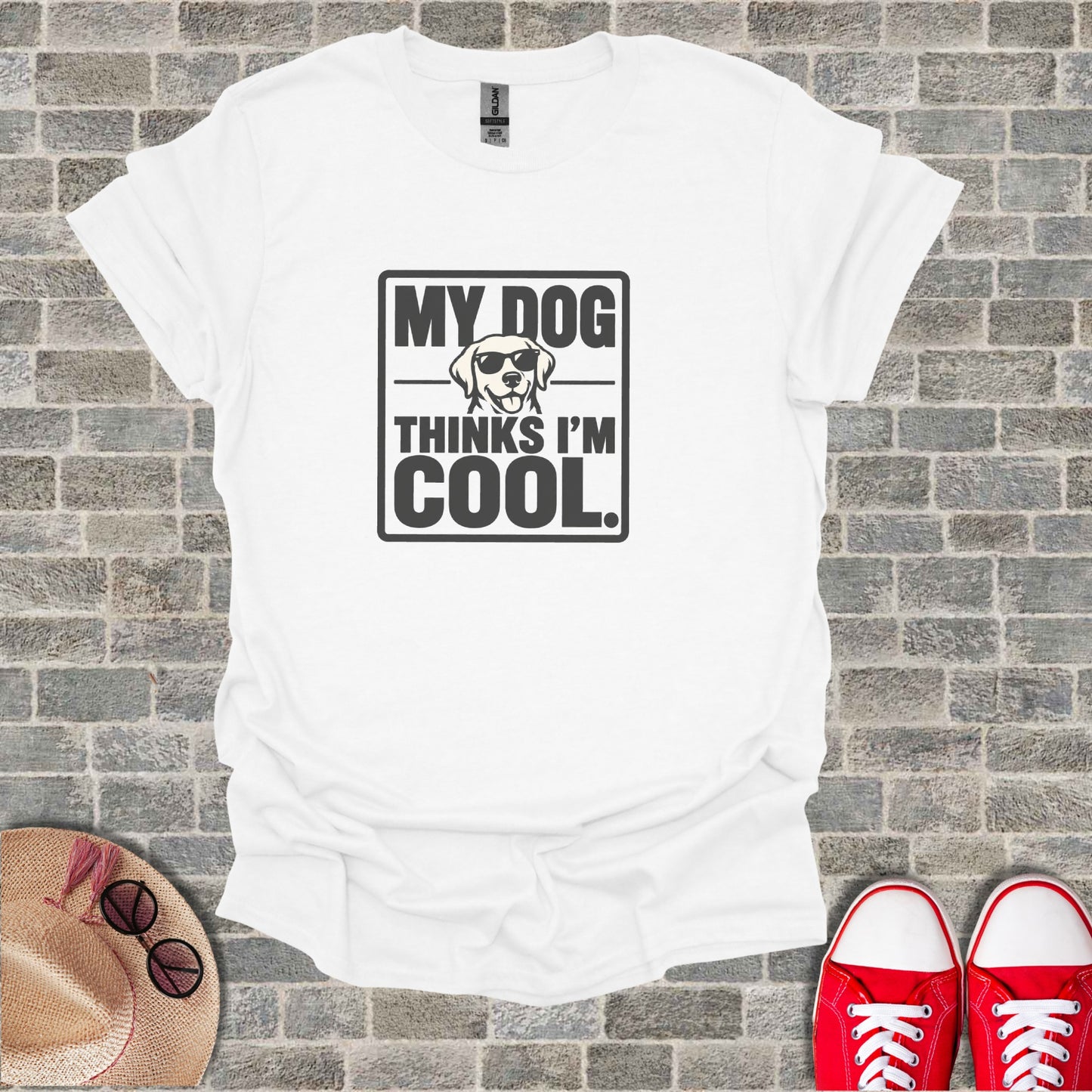 White t-shirt with "My Dog Thinks I'm Cool" and sunglasses-wearing dog graphic.