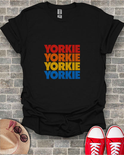 Black t-shirt with "YORKIE" in red, orange, yellow, and blue text.