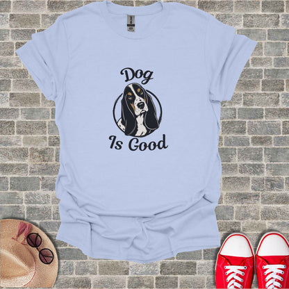 Light blue t-shirt with a graphic of a Basset Hound and the text "Dog Is Good."