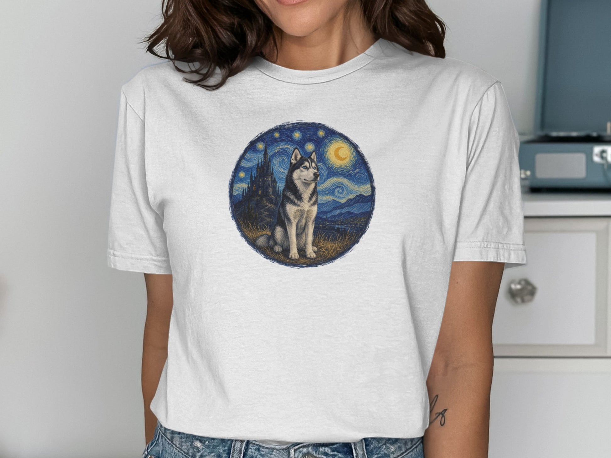 White t-shirt featuring a husky sitting under a starry night sky.
