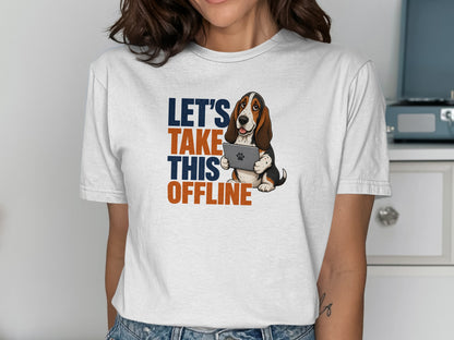 Basset hound in t-shirt holding a tablet with text "LET'S TAKE THIS OFFLINE".