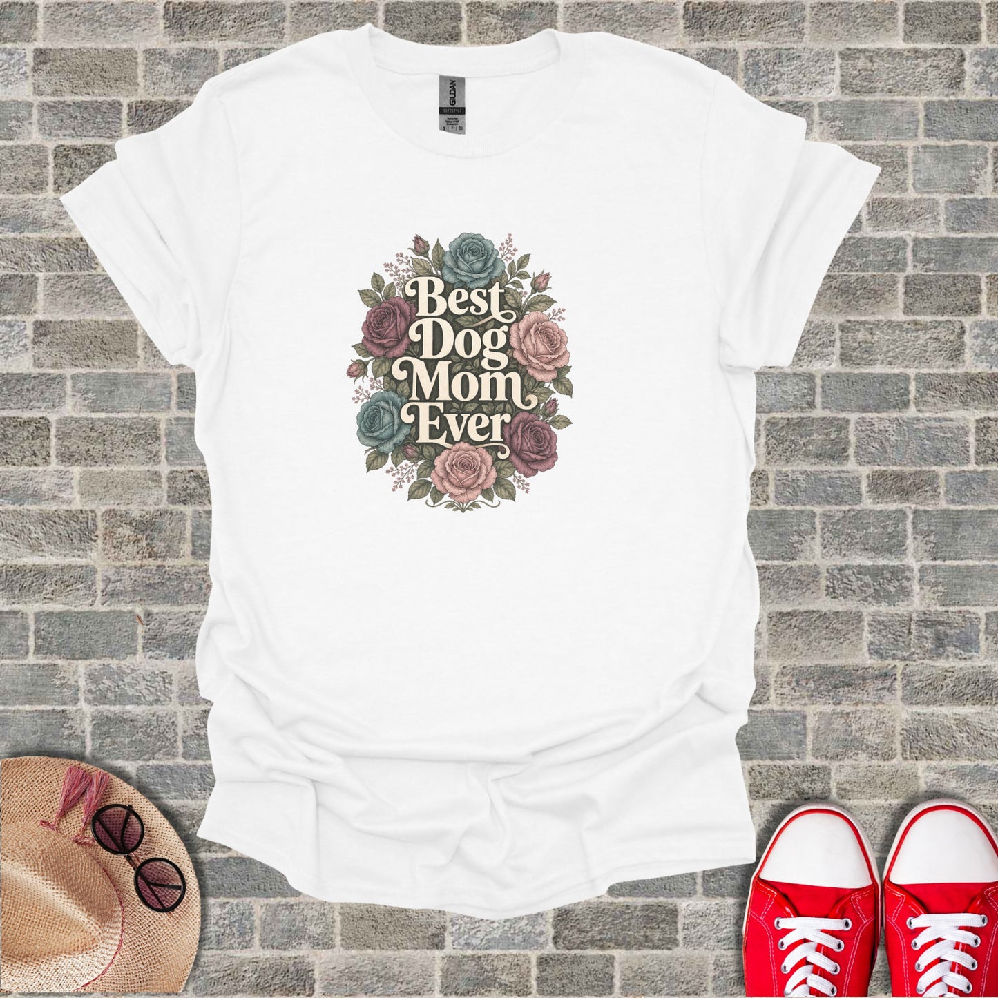 White t-shirt with "Best Dog Mom Ever" text and floral design.