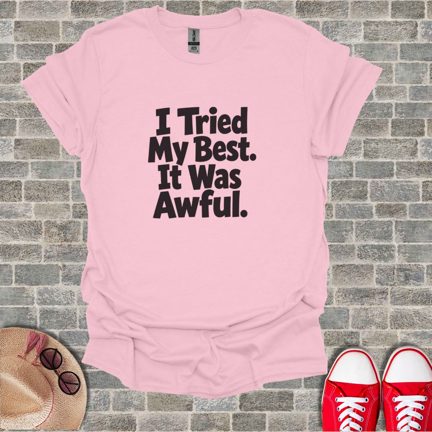 Pink t-shirt with "I Tried My Best. It Was Awful." text.