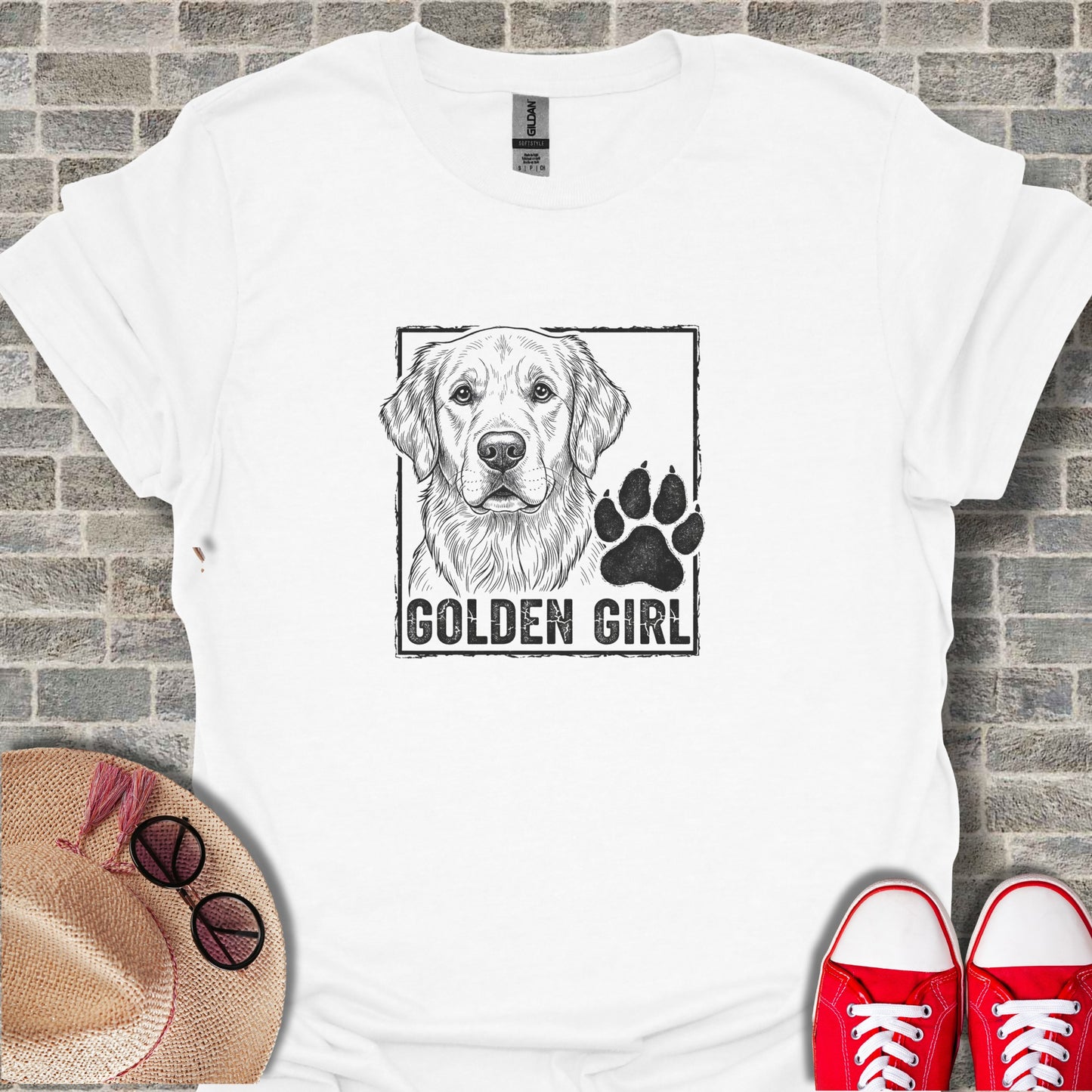 Black and white sketch of a Golden Retriever's head with a paw print and "GOLDEN GIRL" text.