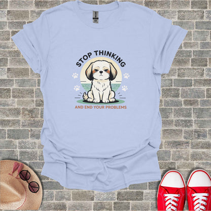 Light blue t-shirt with a grumpy dog graphic and text "Stop Thinking and End Your Problems".