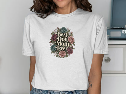 White t-shirt with "Best Dog Mom Ever" text and floral wreath design.