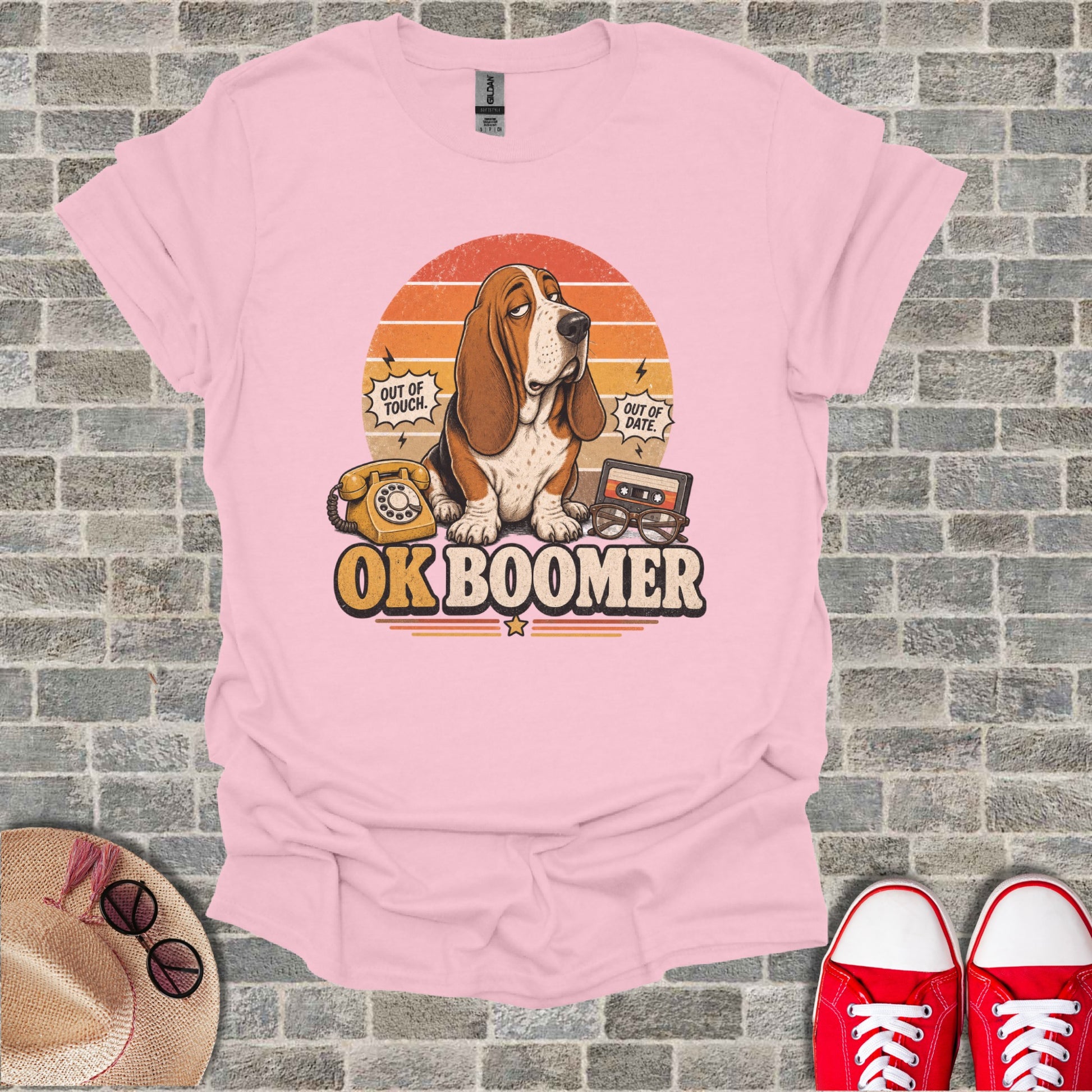 Basset hound wearing glasses with "OK BOOMER" text and retro items.