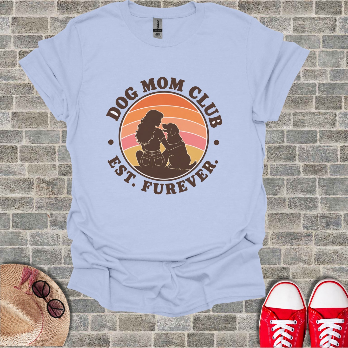 Light blue t-shirt with "Dog Mom Club Est. Furever" and silhouette of a woman and dog.