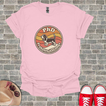 Pink t-shirt with "PhD Probably Has Dogs" vintage circular graphic.
