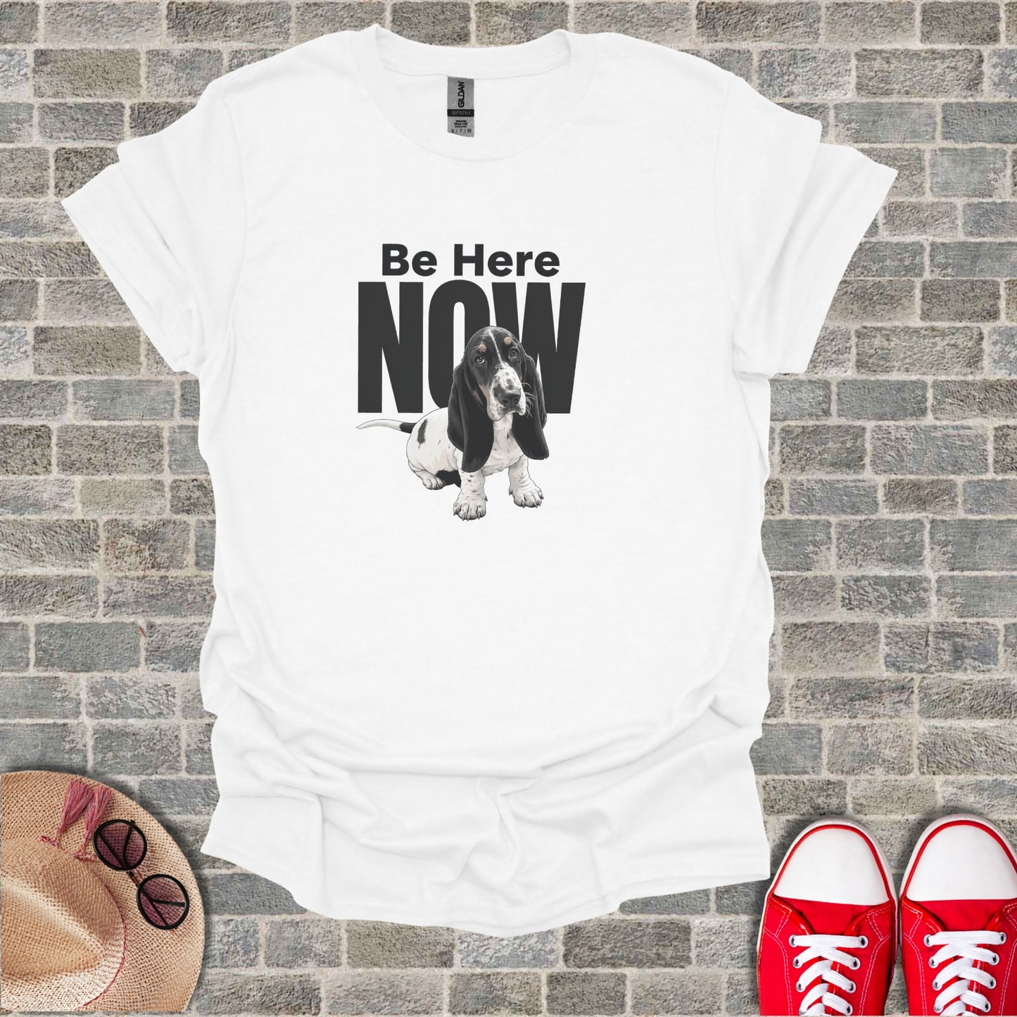 White t-shirt with "Be Here NOW" and a Basset Hound illustration.