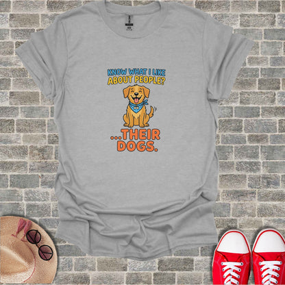 T-shirt with smiling dog graphic and text: "Know what I like about people?...Their dogs."