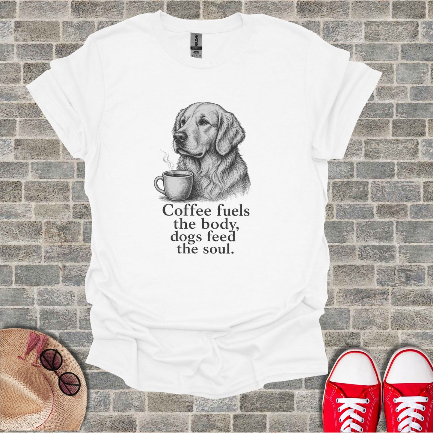 White t-shirt with sketch of golden retriever and coffee cup, text reads "Coffee fuels the body, dogs feed the soul."