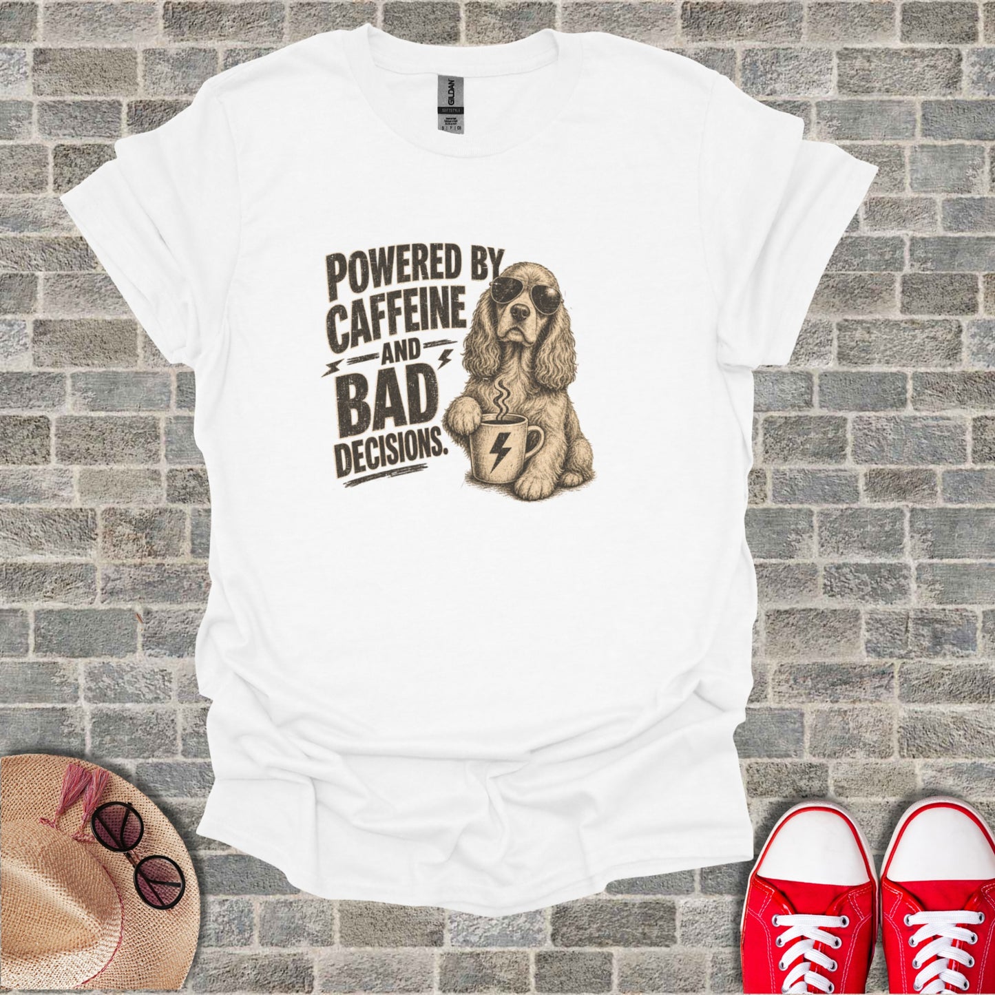 White t-shirt with "Powered by caffeine and bad decisions" text and a dog wearing sunglasses.