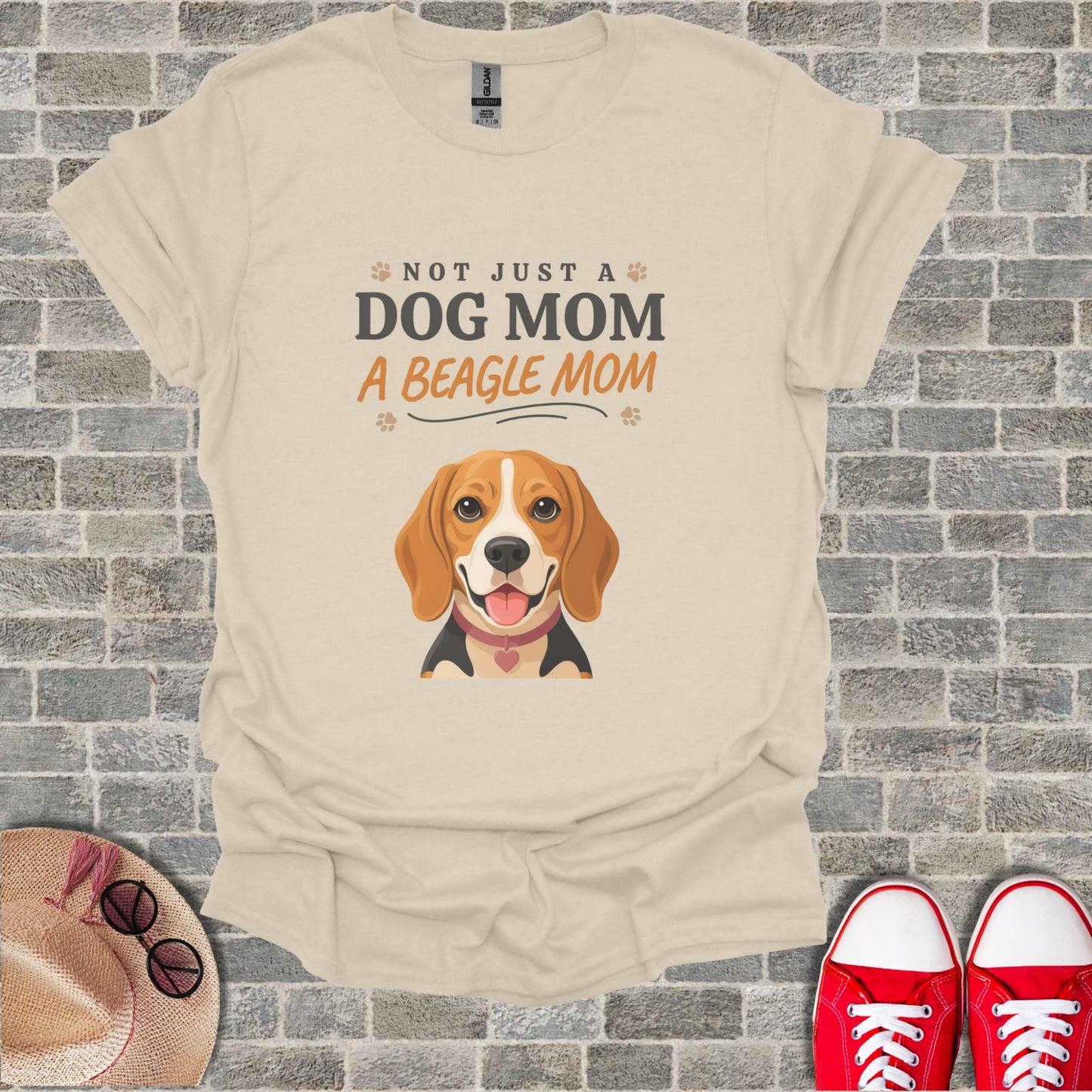 Light beige t-shirt with beagle graphic and text "Not Just a Dog Mom, A Beagle Mom."