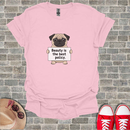 Pink t-shirt with a pug holding a sign that says "Beauty is the best policy."