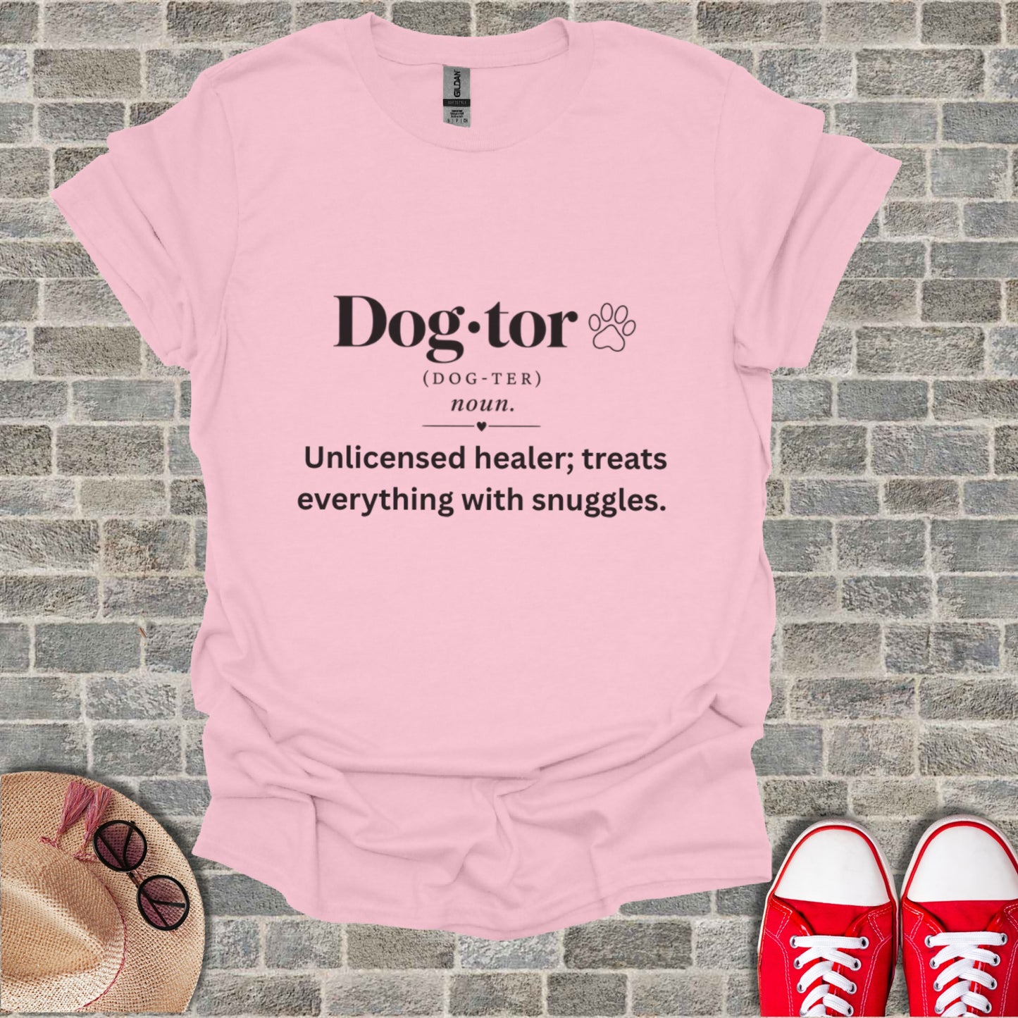 Pink t-shirt with "Dog-tor" definition and paw print.