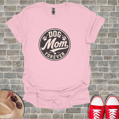 Pink t-shirt with "Dog Mom Forever" circular graphic and paw prints.