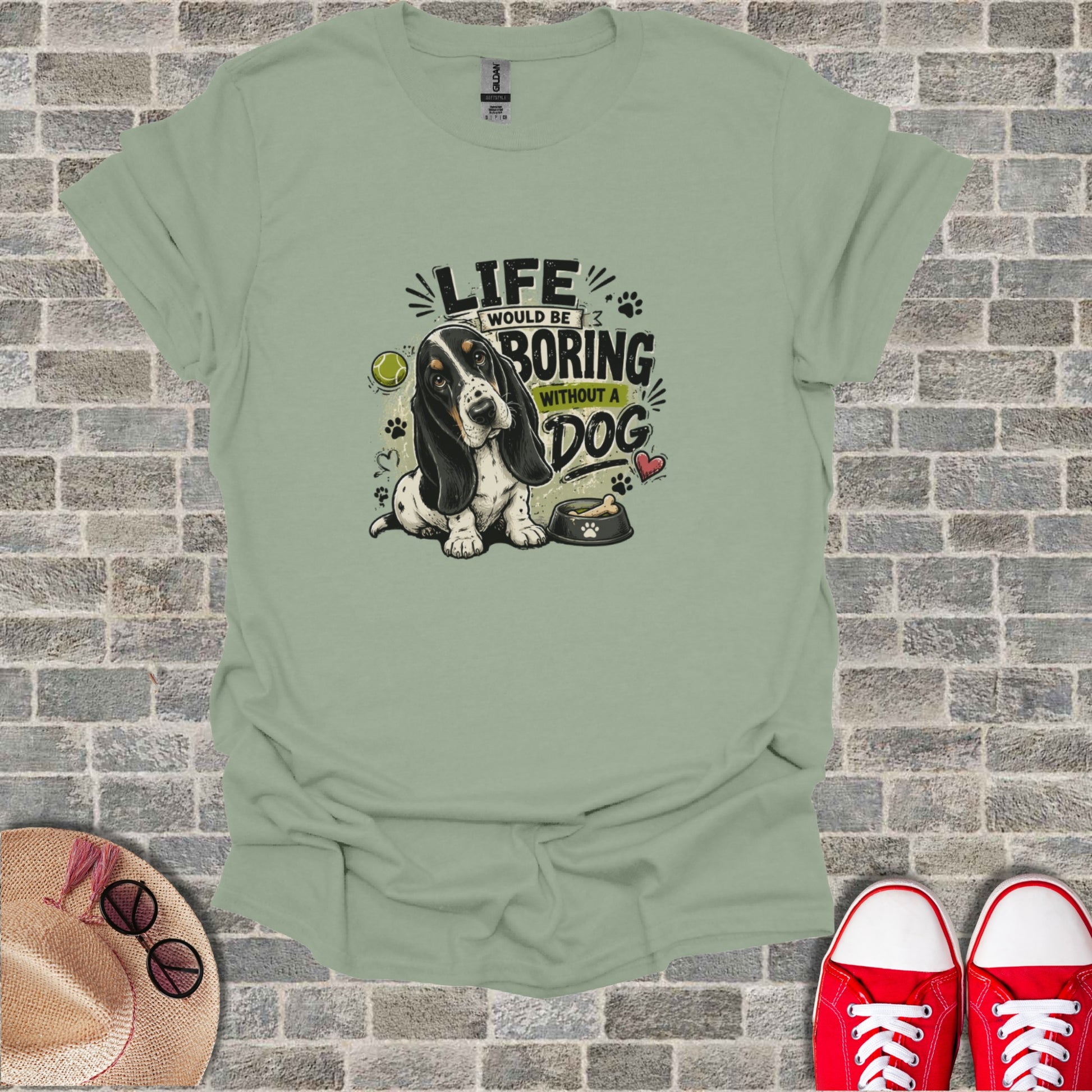 Basset hound sitting by food bowl with text "Life would be boring without a dog."