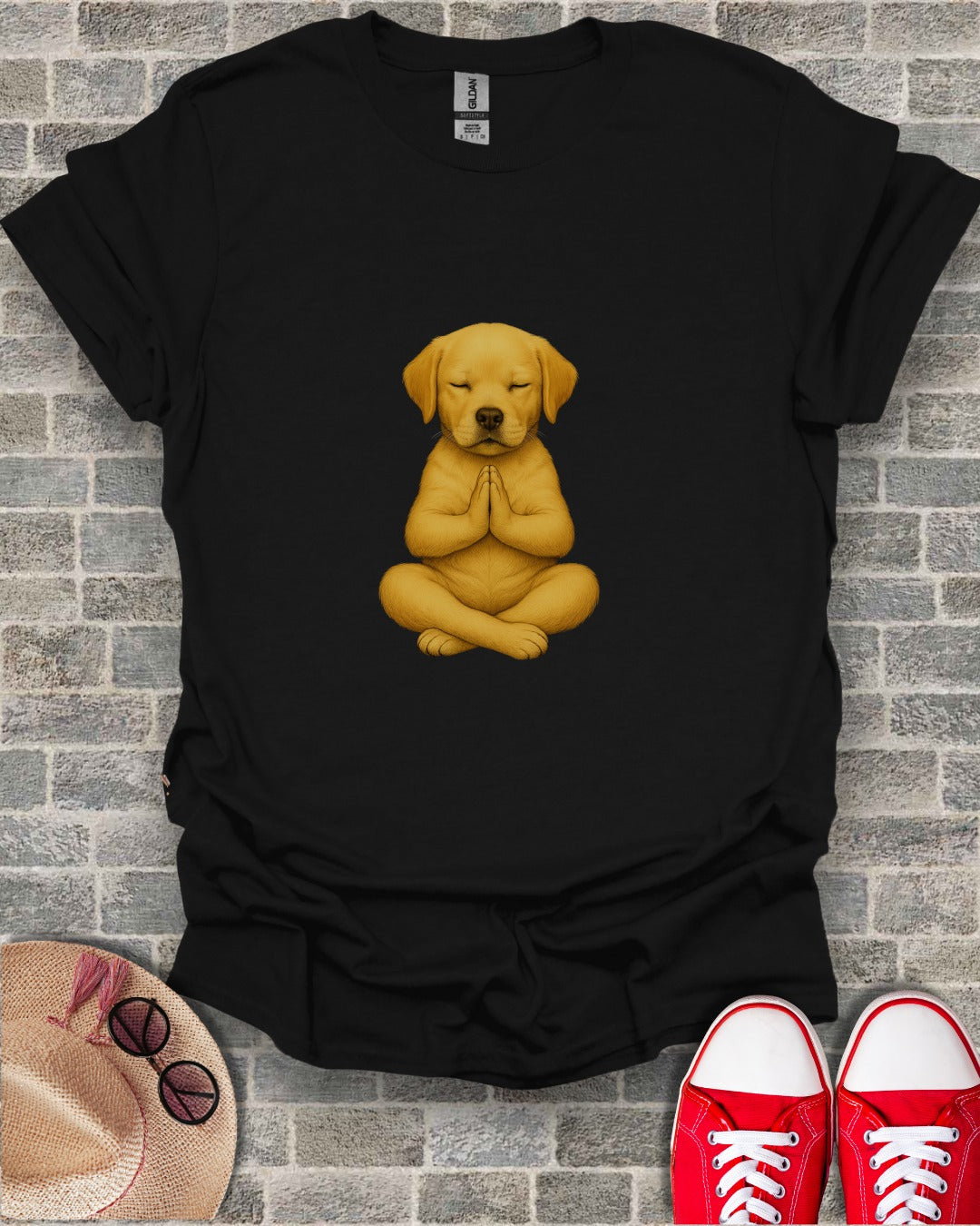 Black t-shirt with a golden labrador puppy meditating in lotus pose.