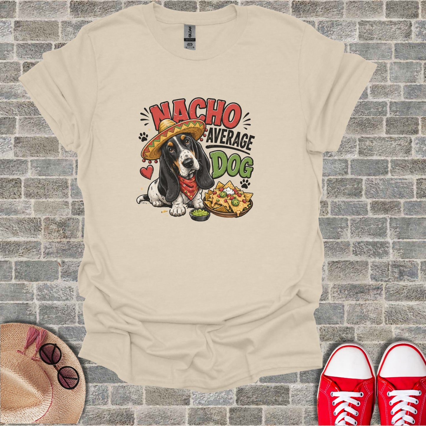 T-shirt with dog wearing a sombrero and bandana, holding nachos.