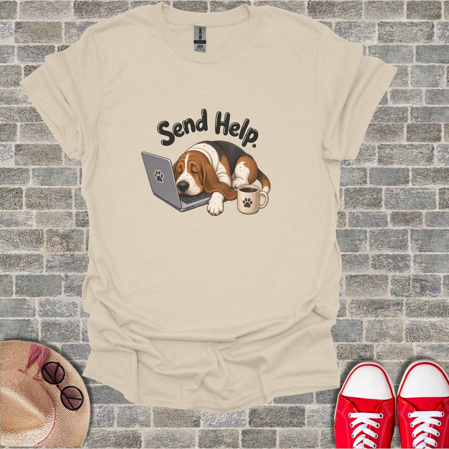 Basset hound sleeps on laptop with "Send Help" text and coffee cup.