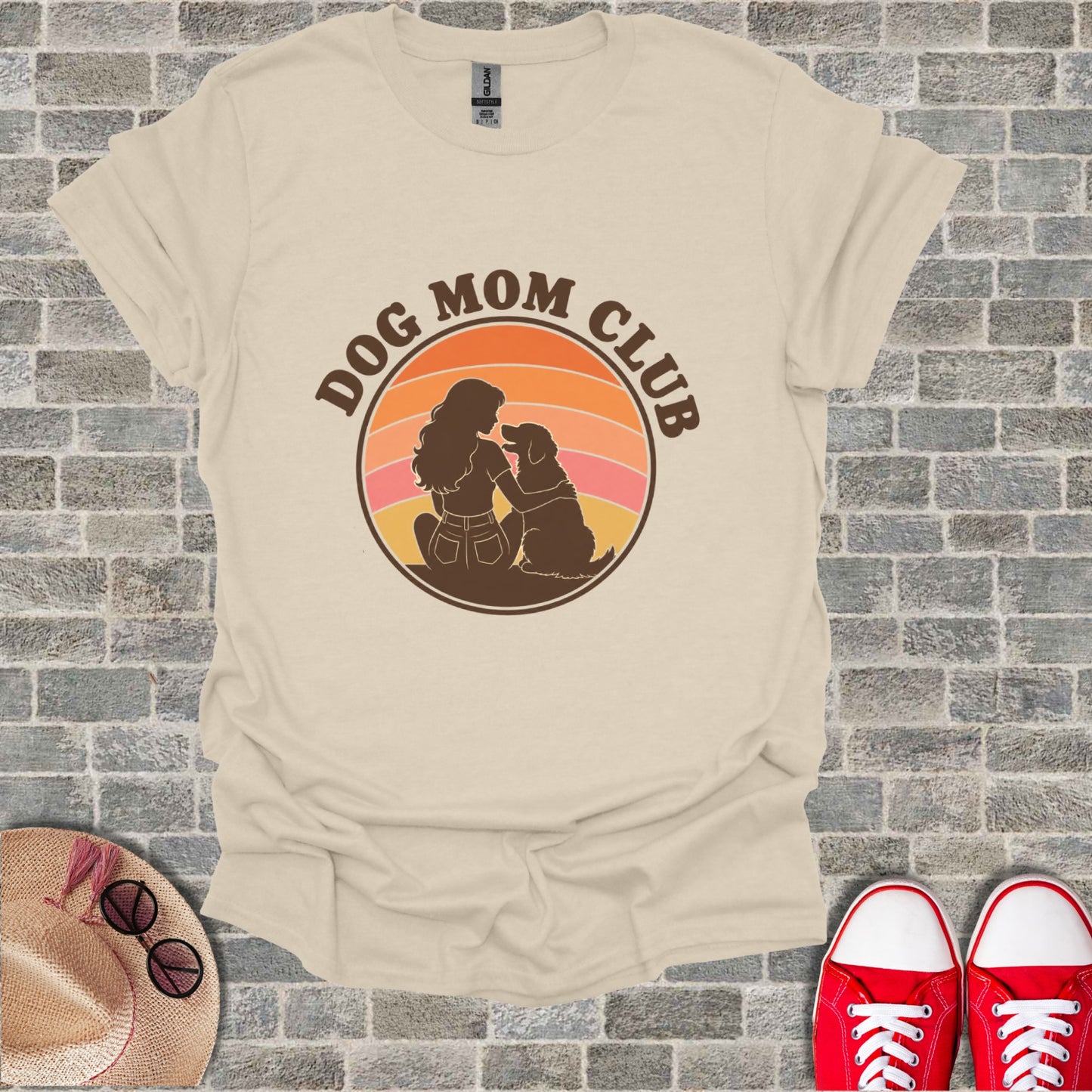 Cream t-shirt with "Dog Mom Club" graphic featuring a woman and her dog.