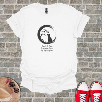 White t-shirt with dog and bonsai tree graphic, text "Breathe In Peace. Breathe Out Stress. My Dog Is My Zen."