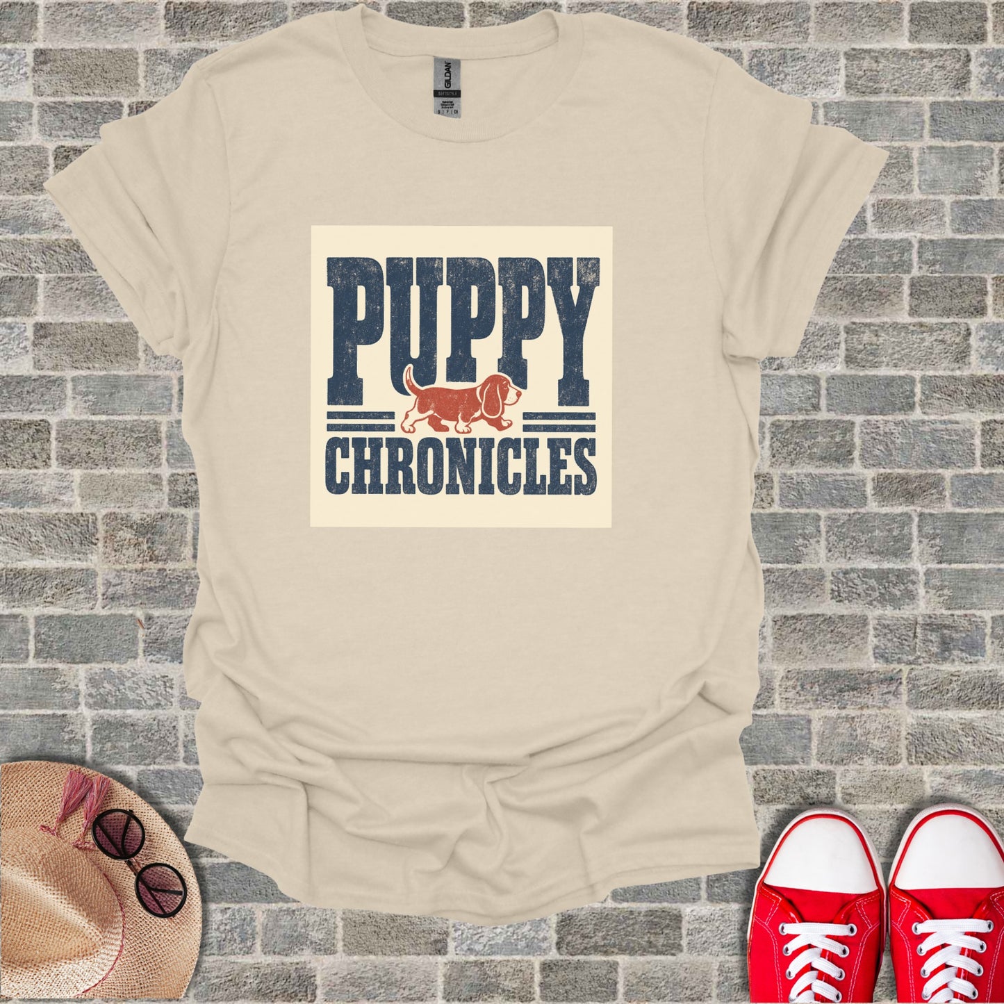 Cream t-shirt with "PUPPY CHRONICLES" text and a dog graphic.