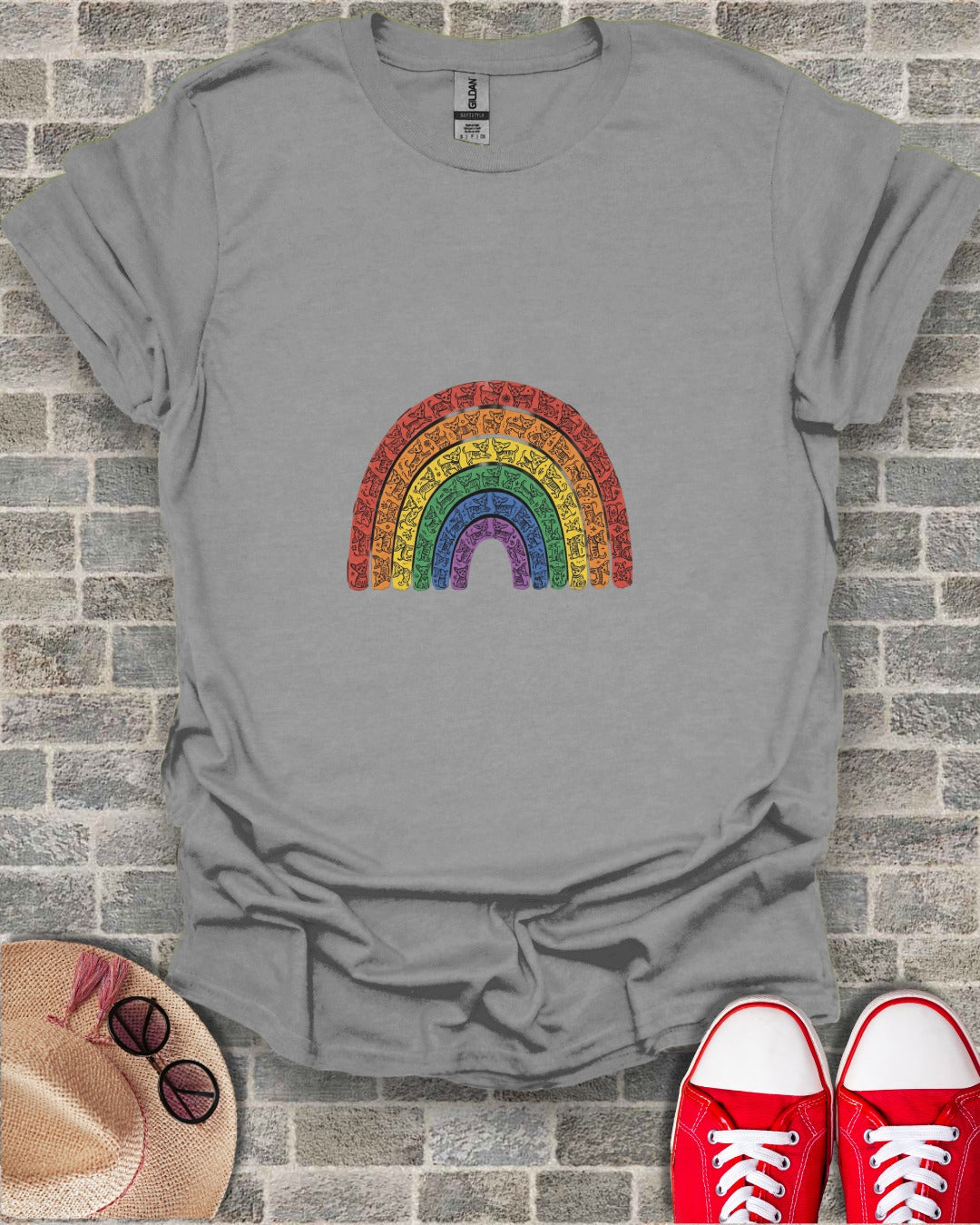 Grey t-shirt with colorful rainbow design featuring animal icons.