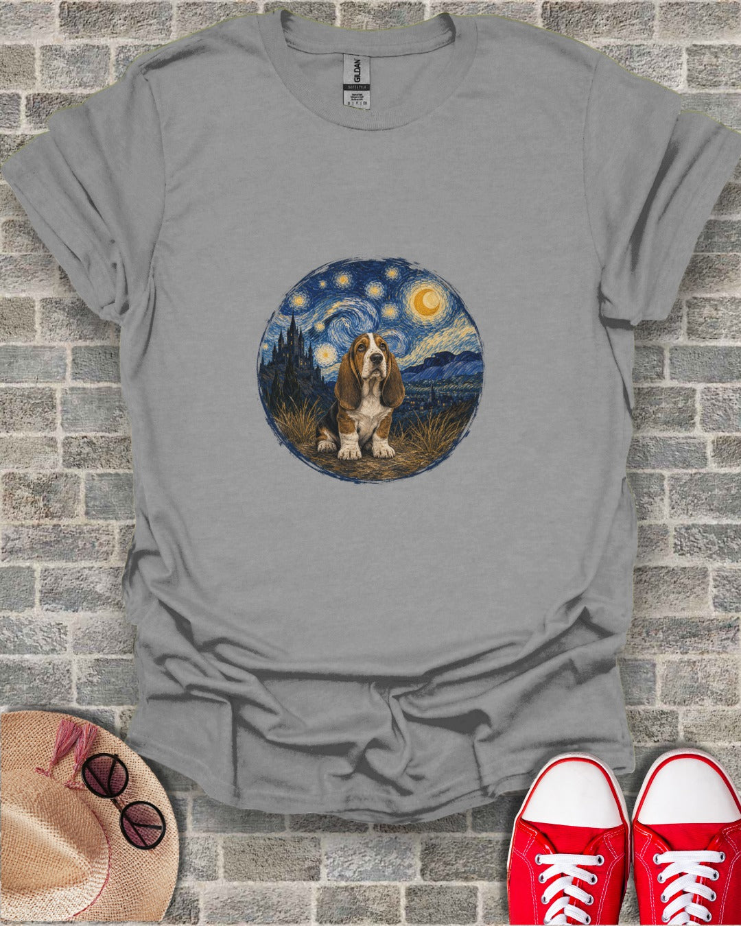 Basset Hound in starry night landscape on grey t-shirt.