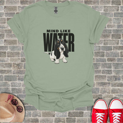 Sage t-shirt with "Mind Like Water" text and a Basset Hound puppy graphic.