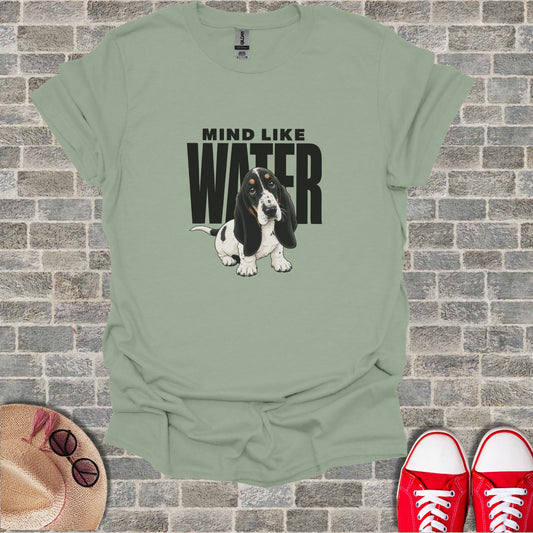 Sage t-shirt with "Mind Like Water" text and a Basset Hound puppy graphic.