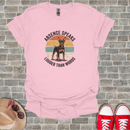 Pink t-shirt with a vintage-style illustration of a dog and text.