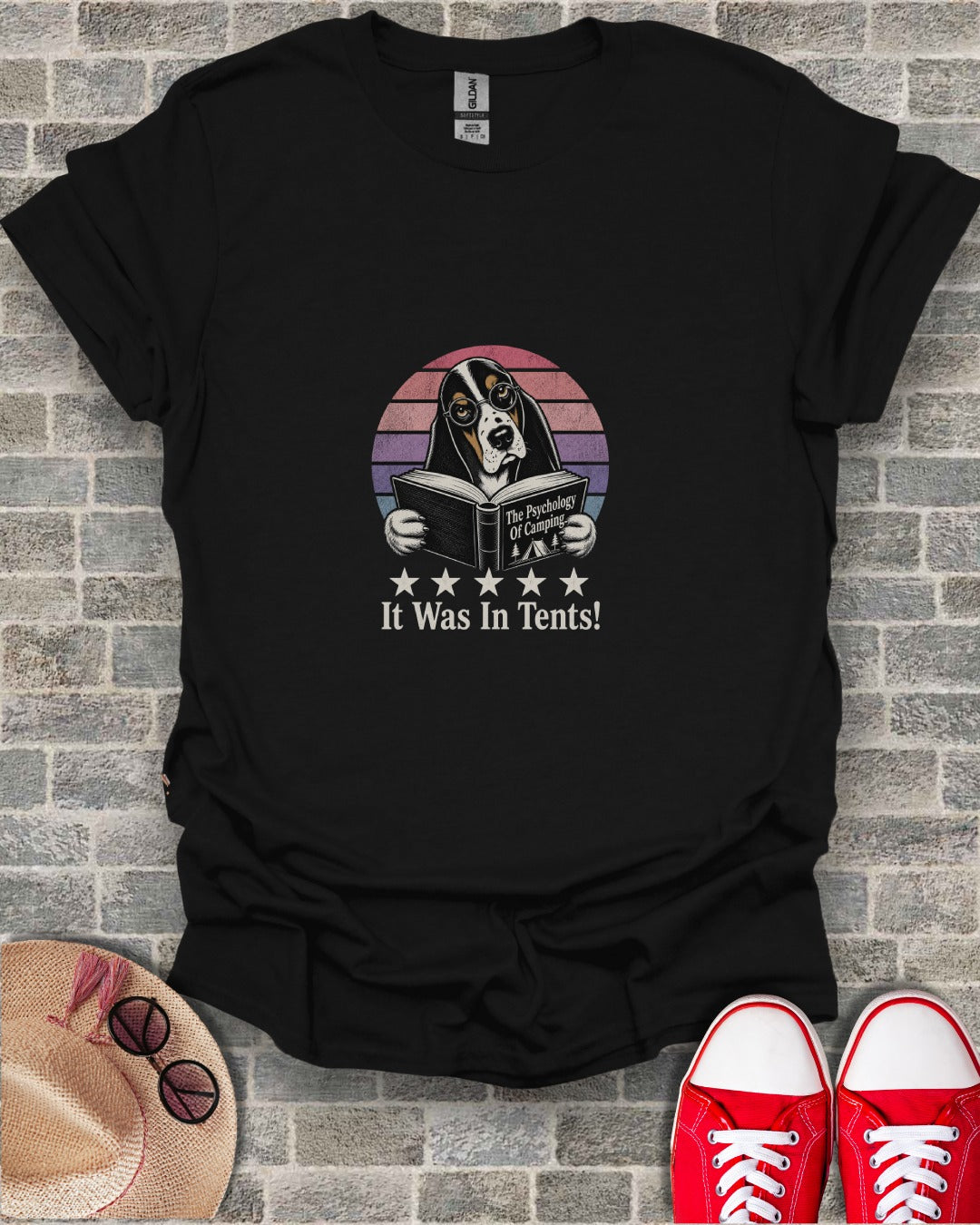 Black t-shirt with a basset hound reading a book, with text "The Psychology of Camping" and "It Was In Tents!".