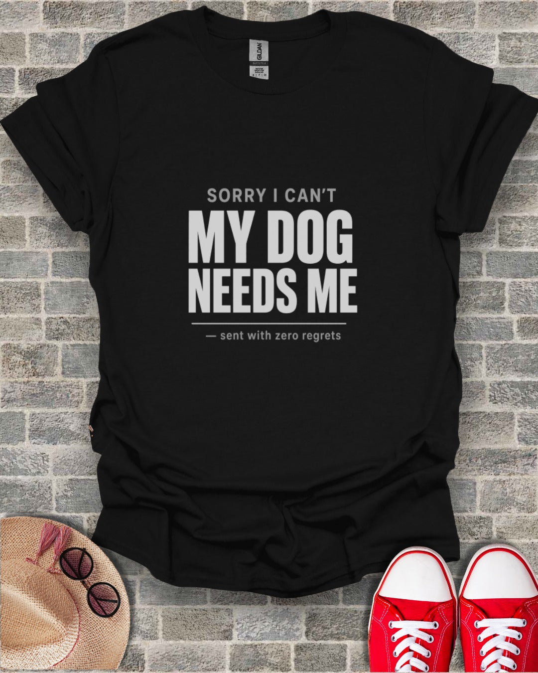 Black t-shirt with white text "SORRY I CAN'T MY DOG NEEDS ME - sent with zero regrets".