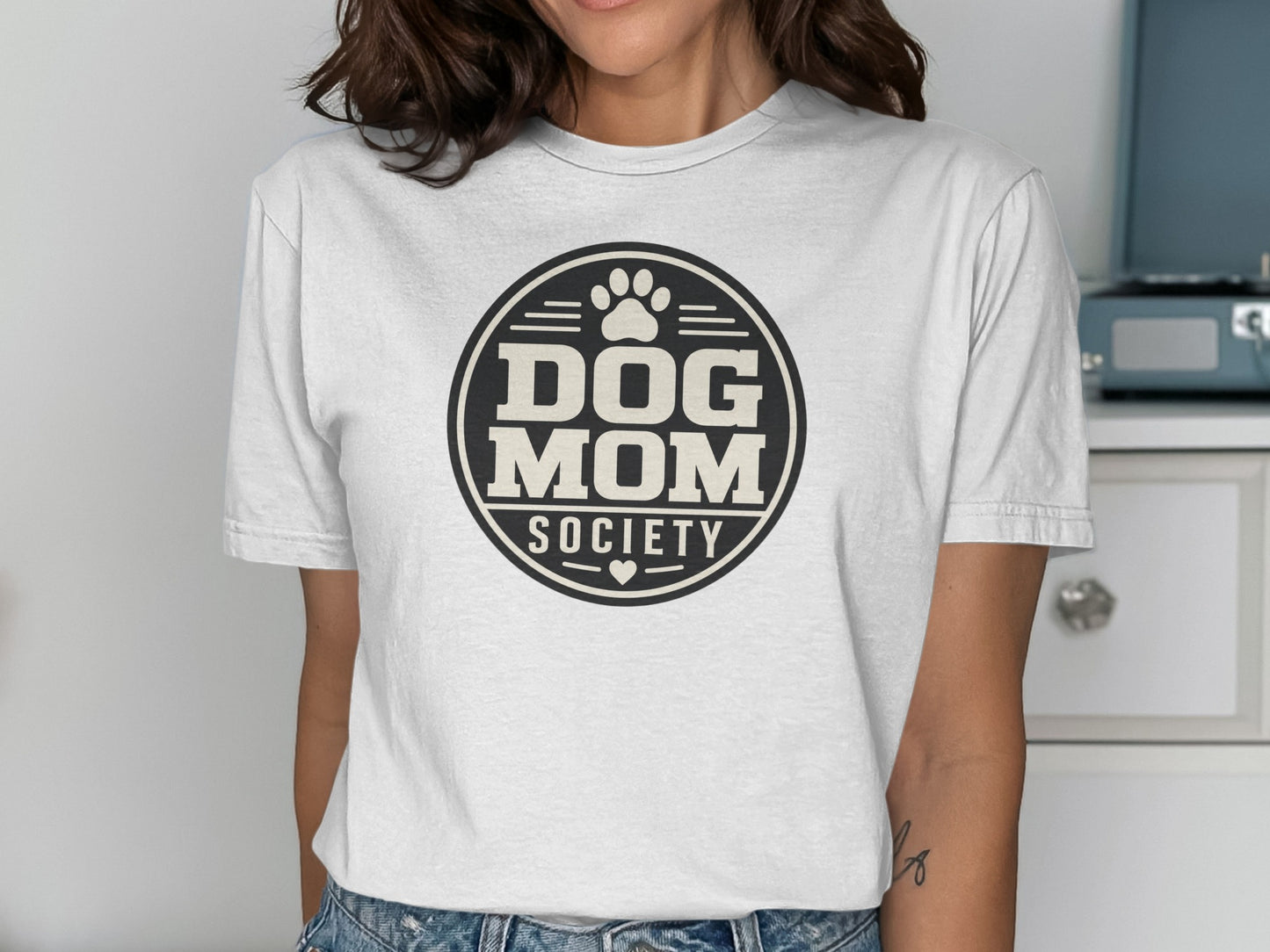 White t-shirt with "Dog Mom Society" circular logo and paw print.