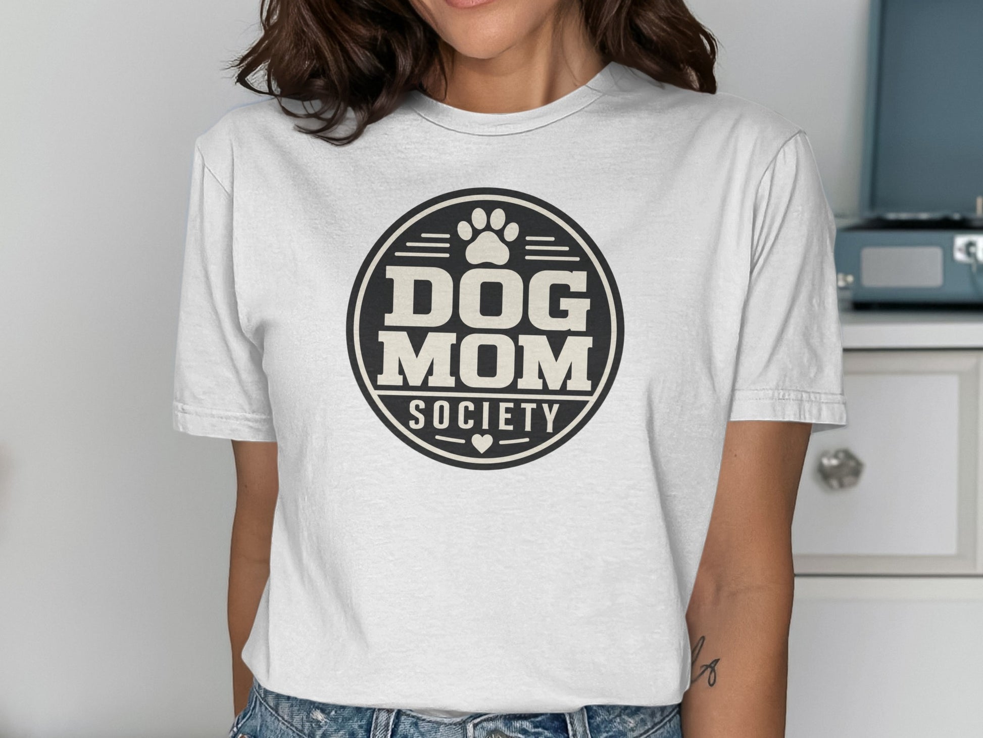 White t-shirt with "Dog Mom Society" circular logo and paw print.