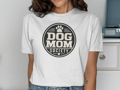 White t-shirt with "Dog Mom Society" circular logo and paw print.
