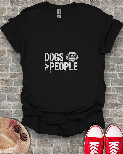 Black t-shirt with "DOGS > PEOPLE" text and sunglasses graphic.