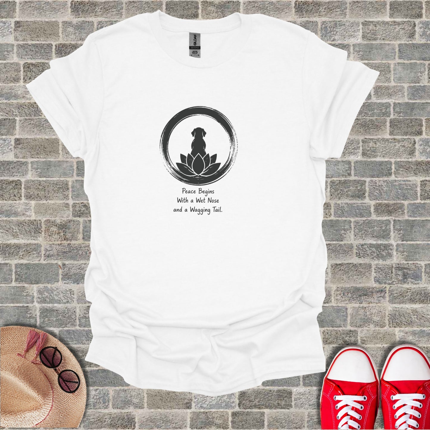 White t-shirt with black dog silhouette in a zen circle, text: "Peace Begins With a Wet Nose and a Wagging Tail."