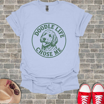 Light blue t-shirt with green distressed "Doodle Life Chose Me" graphic featuring a dog.