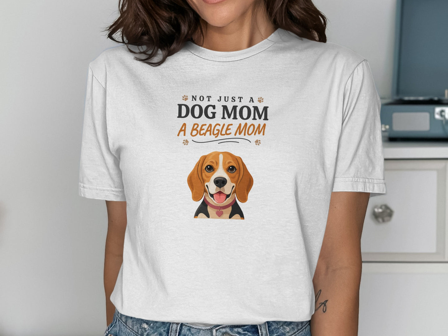 White t-shirt with beagle graphic and text "NOT JUST A DOG MOM A BEAGLE MOM".