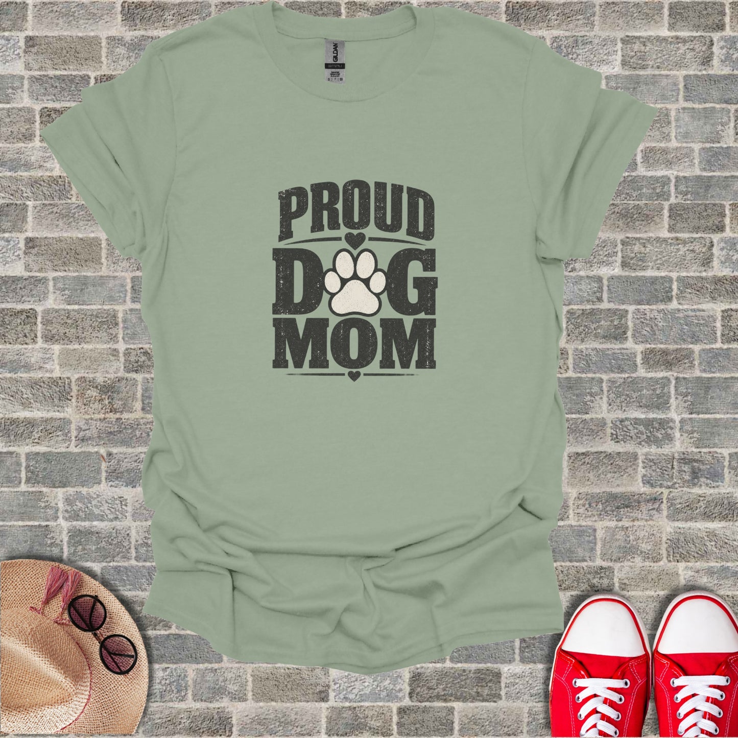 Green t-shirt with "Proud Dog Mom" graphic and paw print.