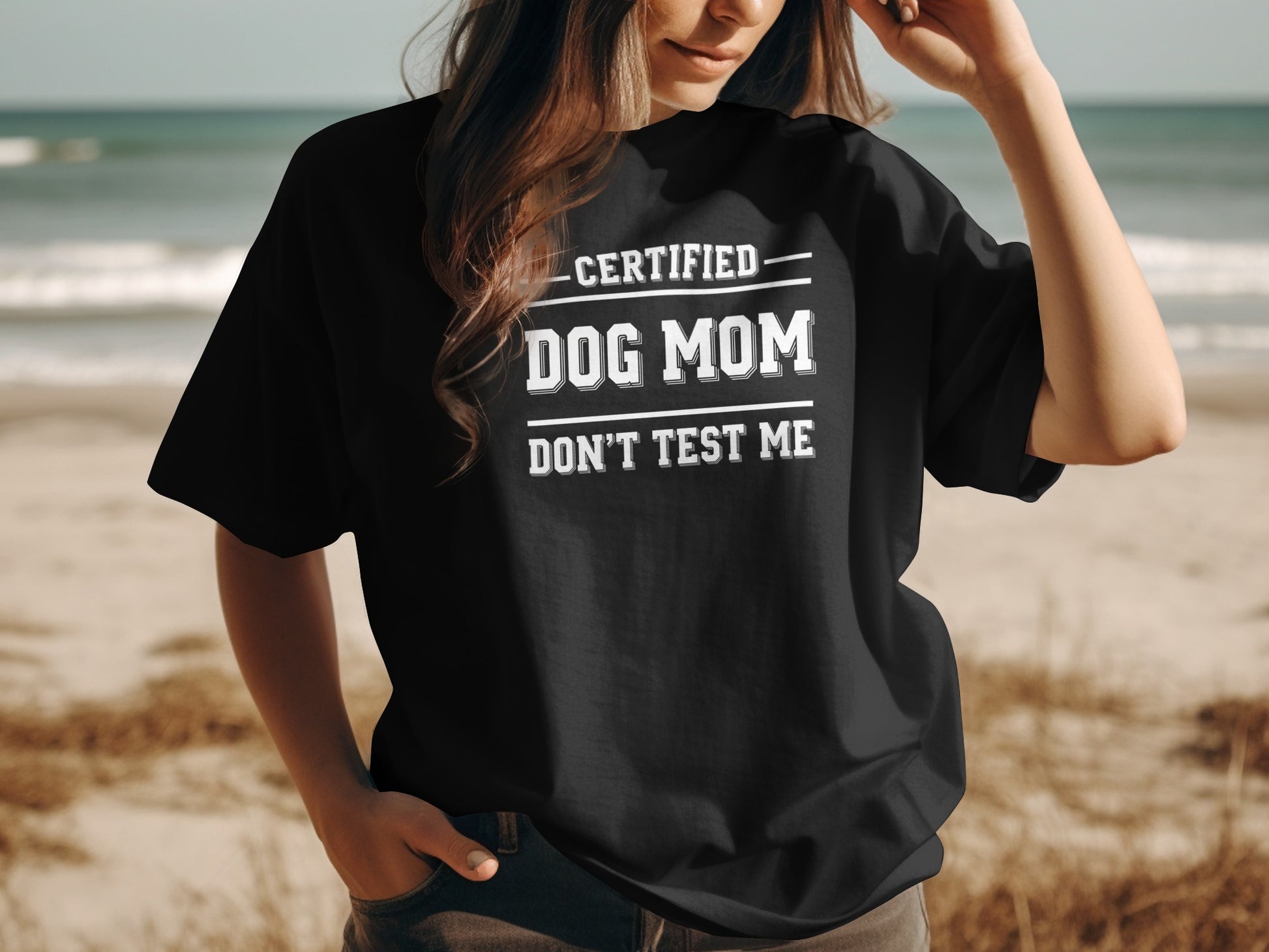 Black t-shirt with white text: CERTIFIED DOG MOM DON'T TEST ME.